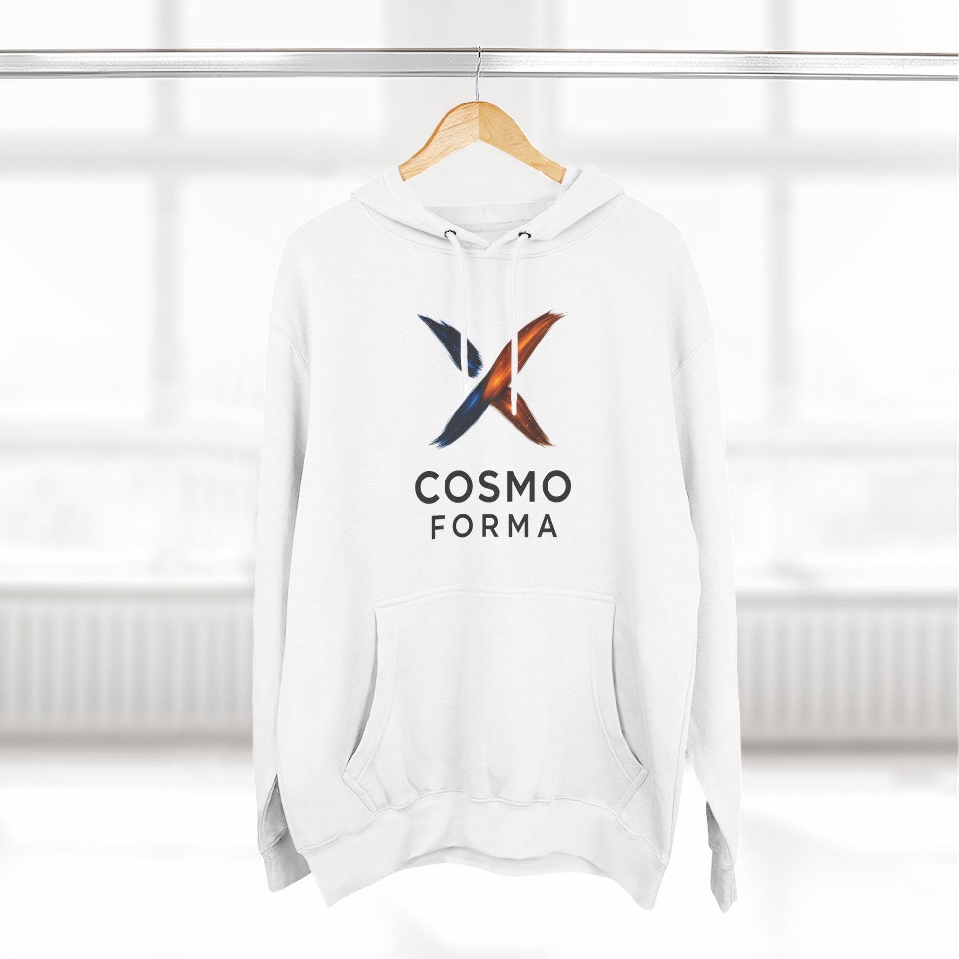 White hoodie with 'Cosmo Forma' logo on a wooden hanger against a white background