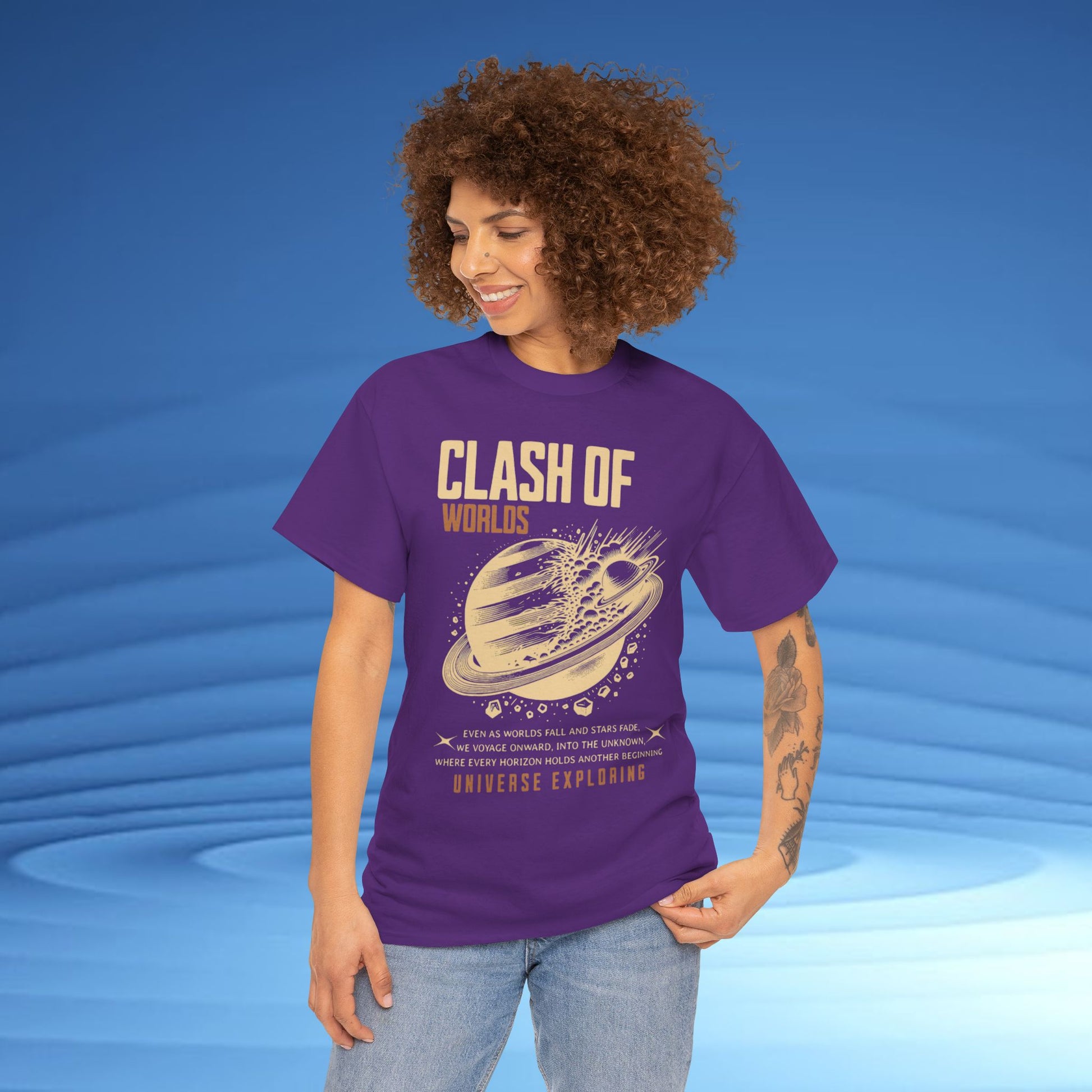 Person wearing a purple t-shirt with 'Clash of Worlds' design on a blue background