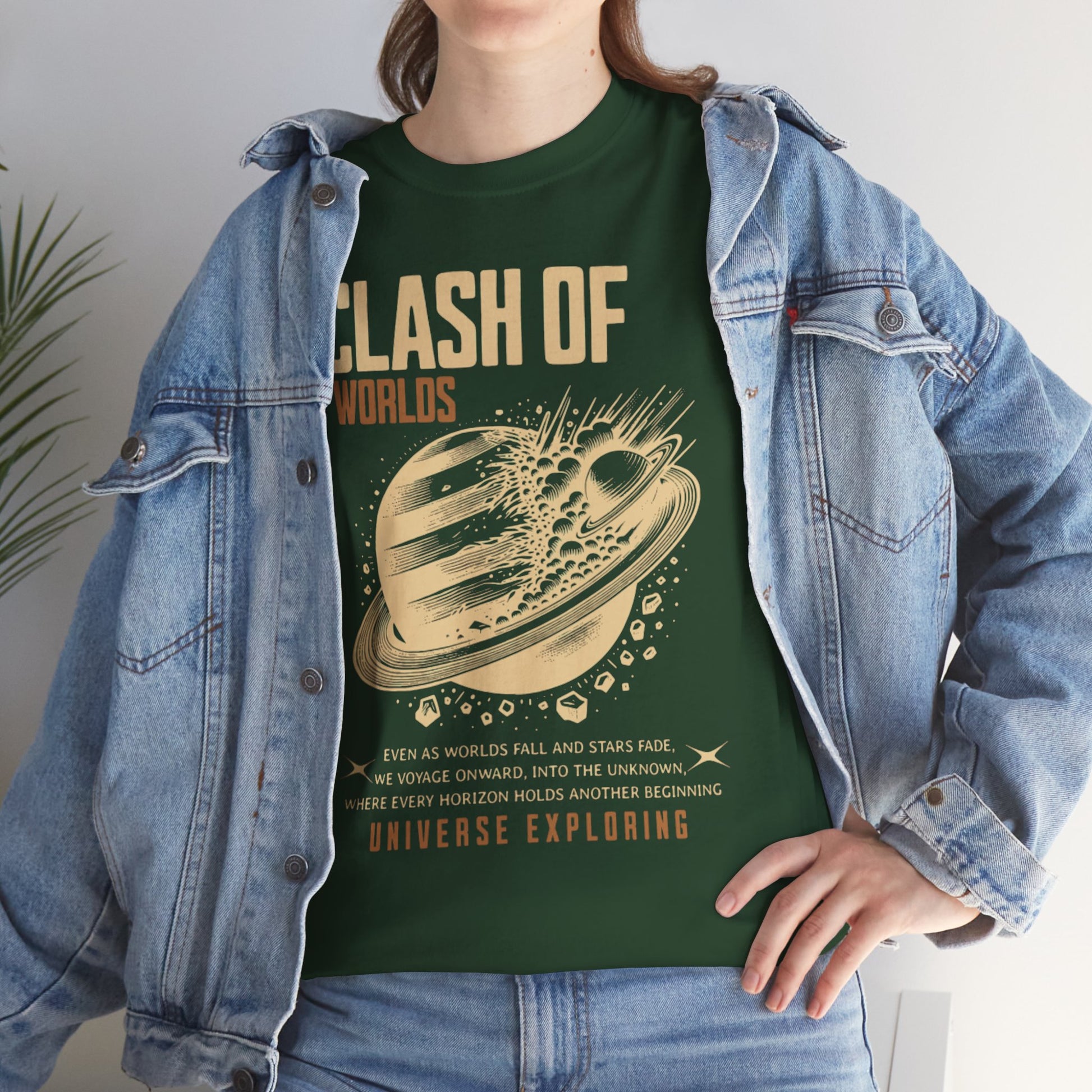 Person wearing a green t-shirt with 'Clash of Worlds' design and denim jacket.