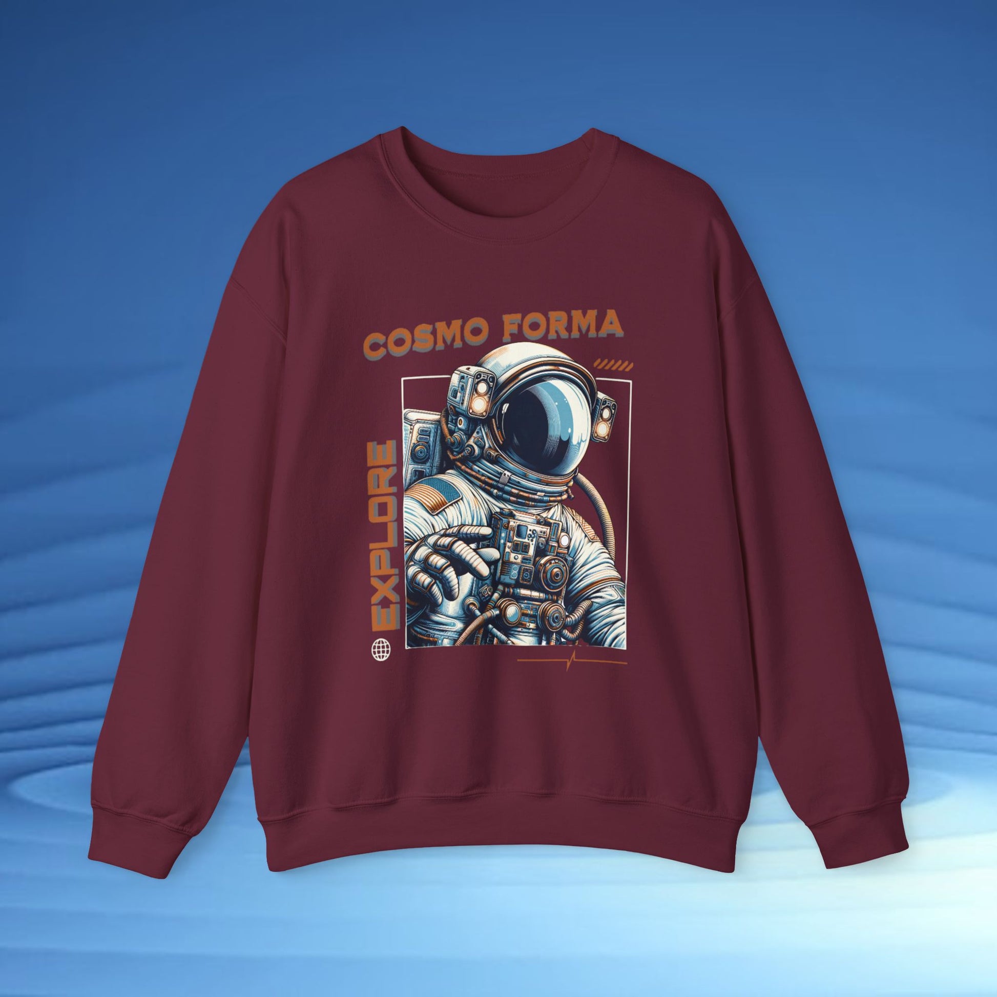 Maroon sweatshirt with astronaut graphic and 'Cosmo Forma' text on a blue background