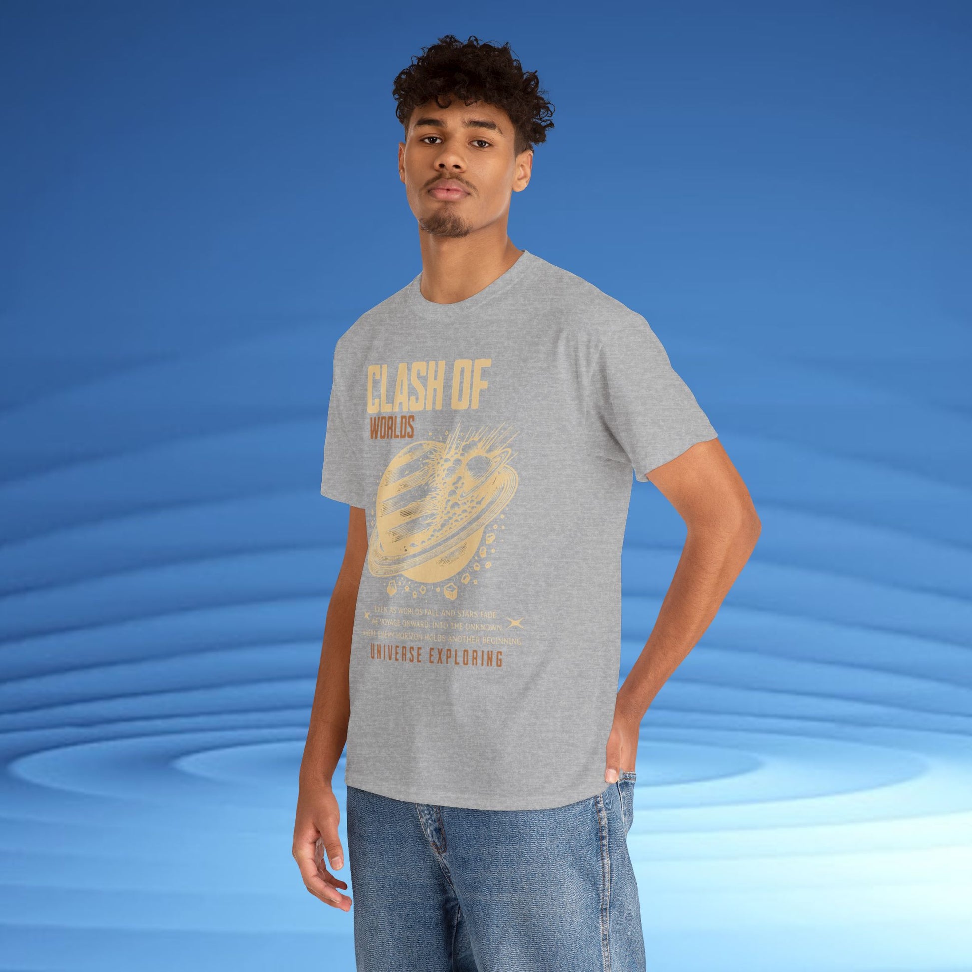 Person wearing a gray t-shirt with a graphic design on a blue background