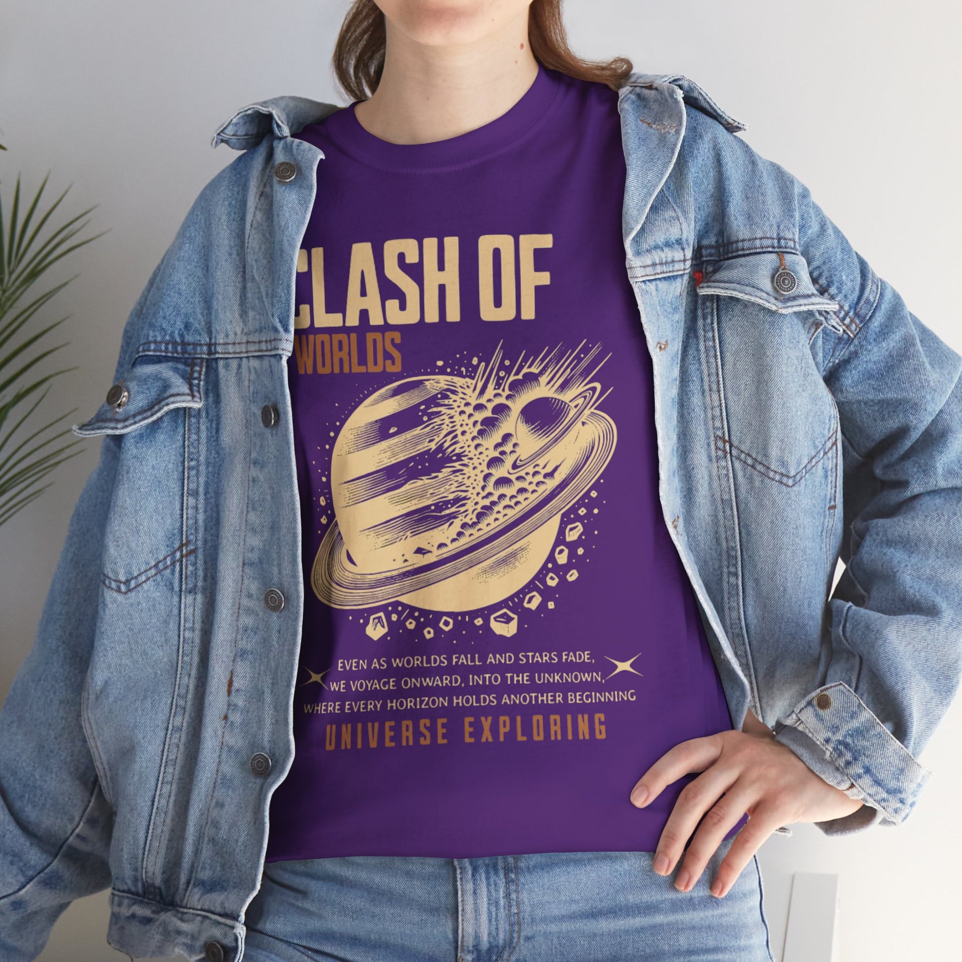 Person wearing a purple t-shirt with 'Clash of Worlds' design and denim jacket.