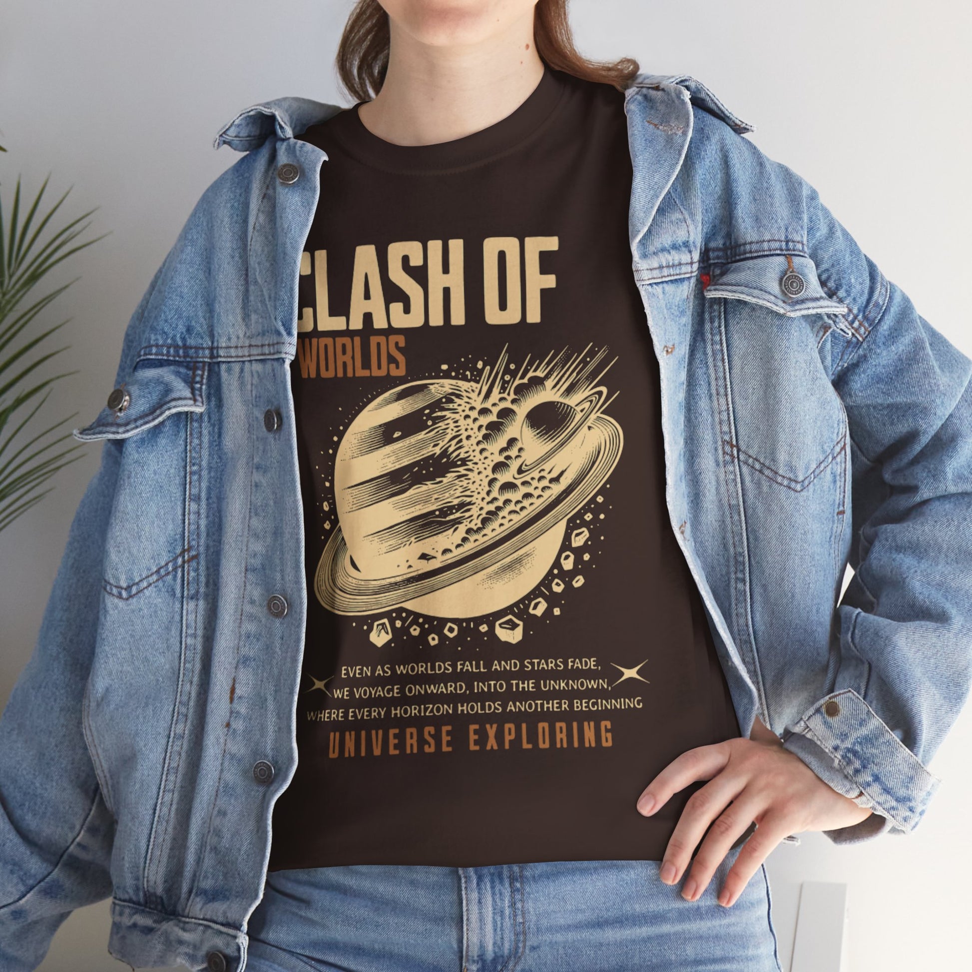 Person wearing a t-shirt with 'Clash of Worlds' design and denim jacket.