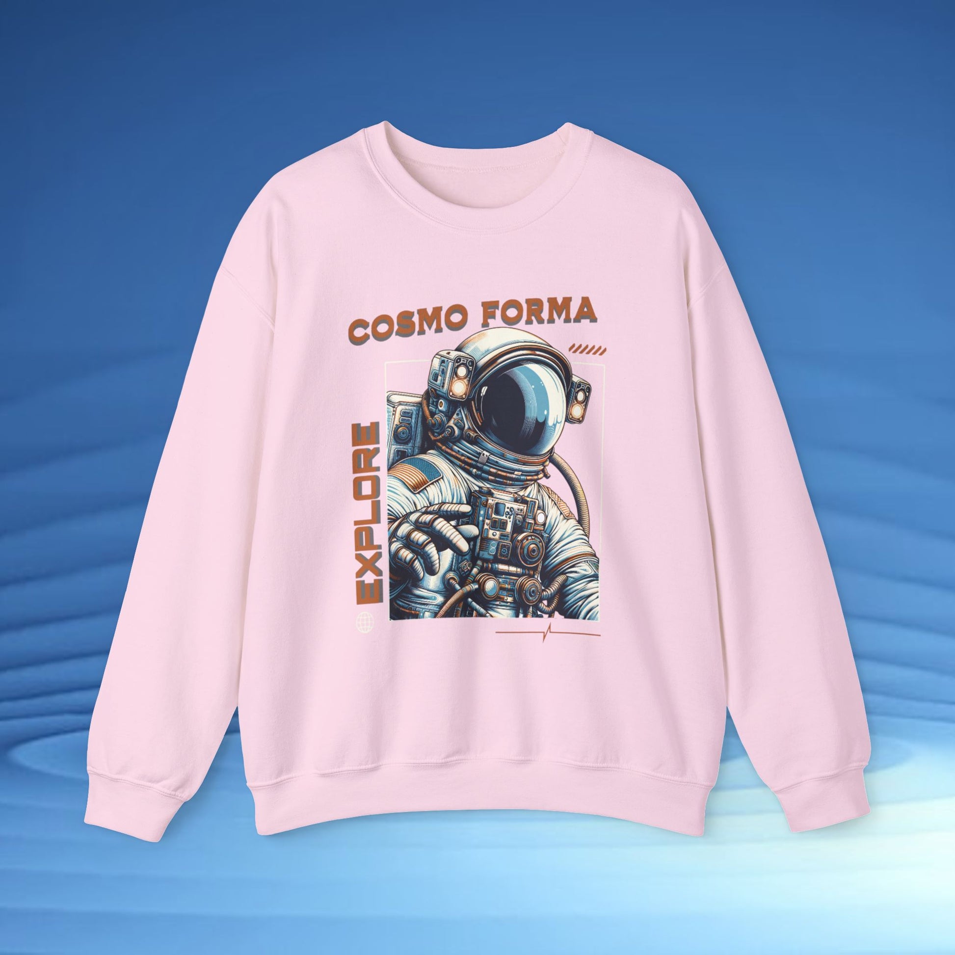 Pink sweatshirt with an astronaut graphic and 'Cosmo Forma' text on a blue gradient background