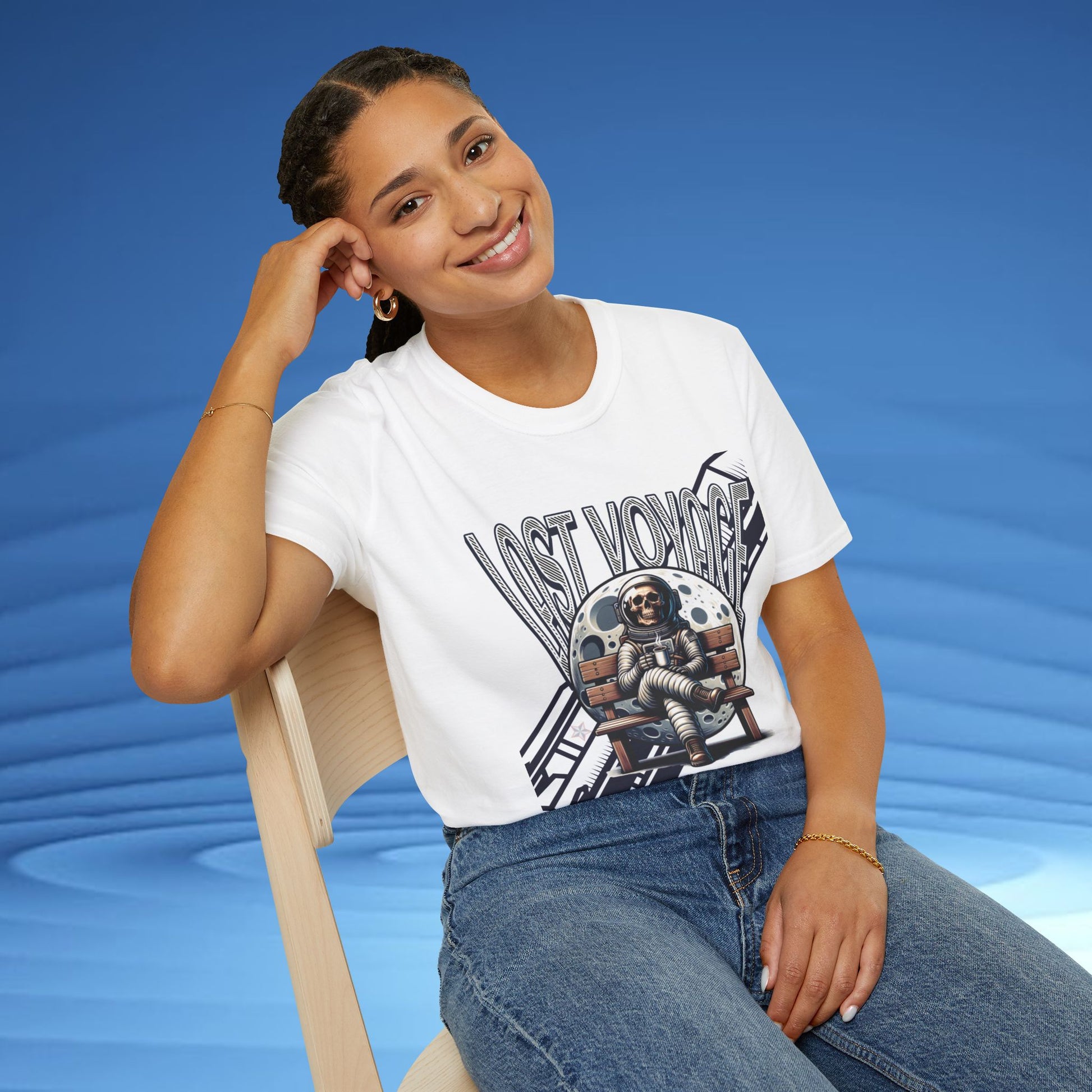 Person wearing a white t-shirt with 'Last Voyage' graphic design on a blue background