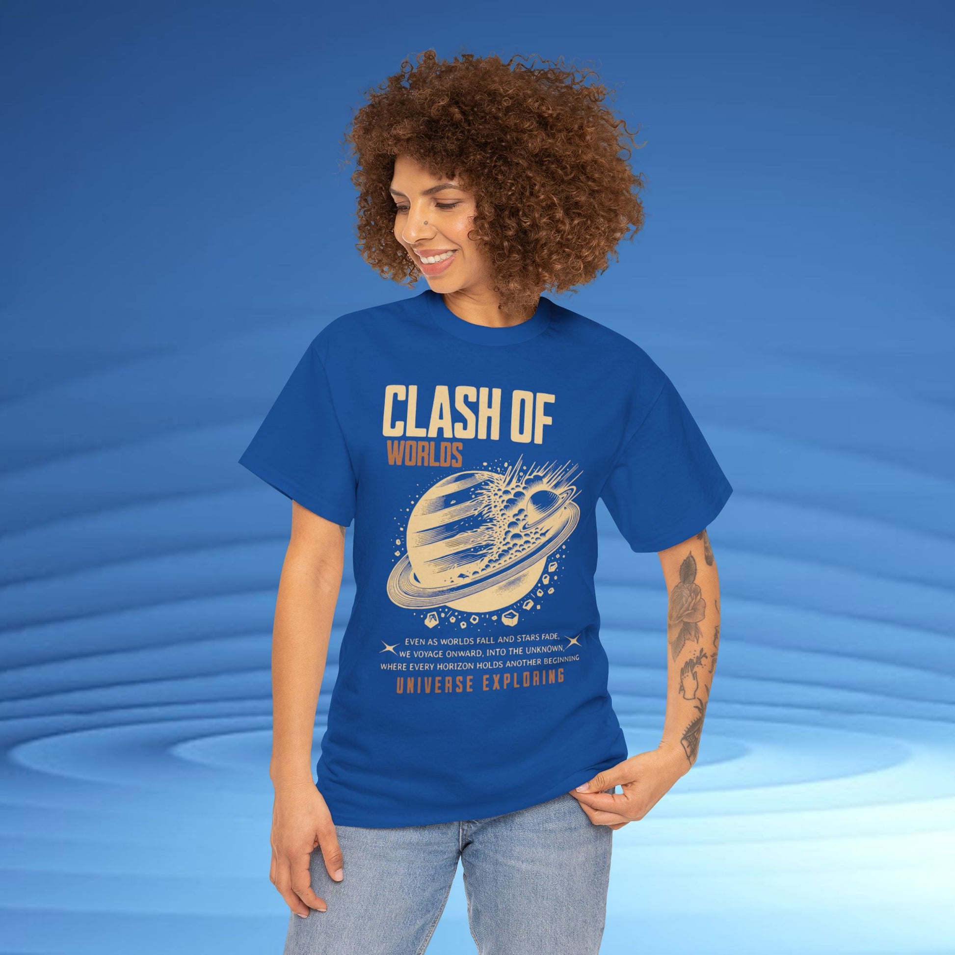 Person wearing a blue t-shirt with 'Clash of Worlds' design on a blue background
