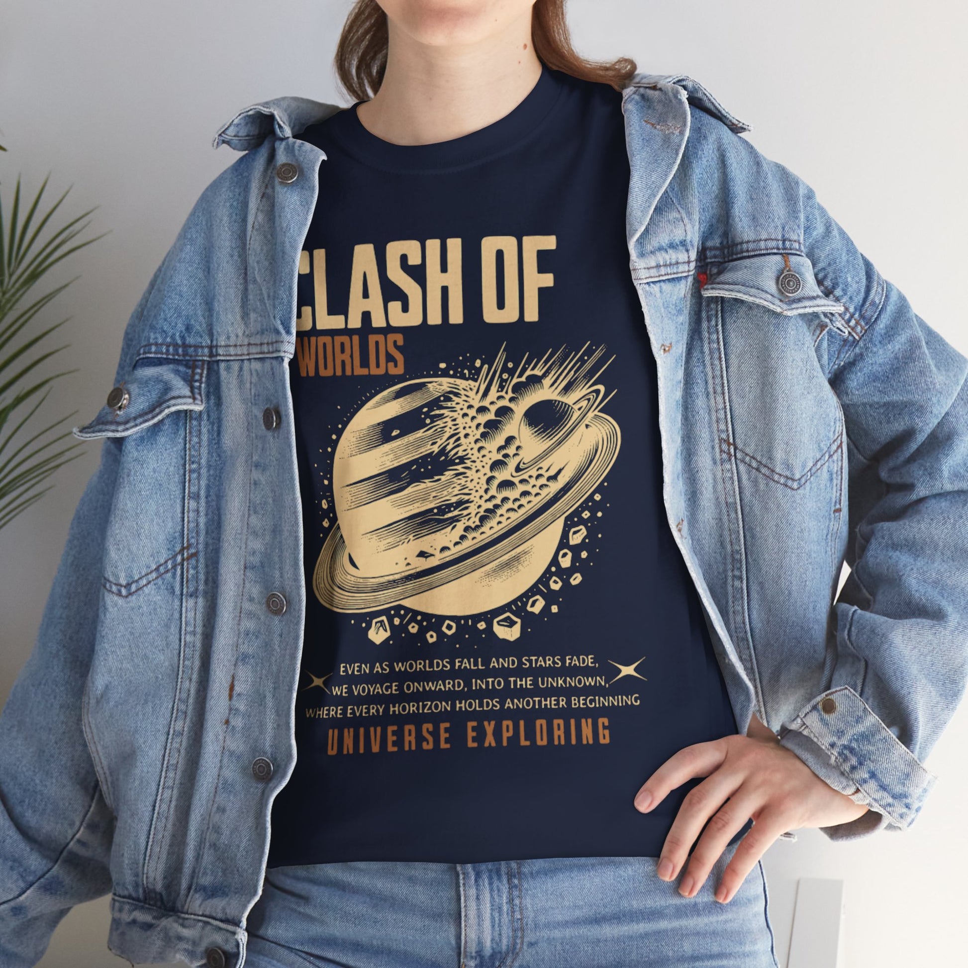 Person wearing a navy t-shirt with 'Clash of Worlds' design and denim  CosmoForma jacket.